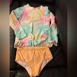 Ruffle Butts swim size 7 Like new